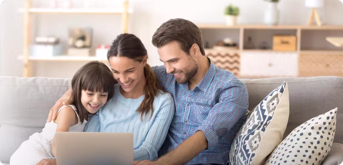 Family using a laptop